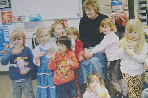 Cheryl with nursery children on open day