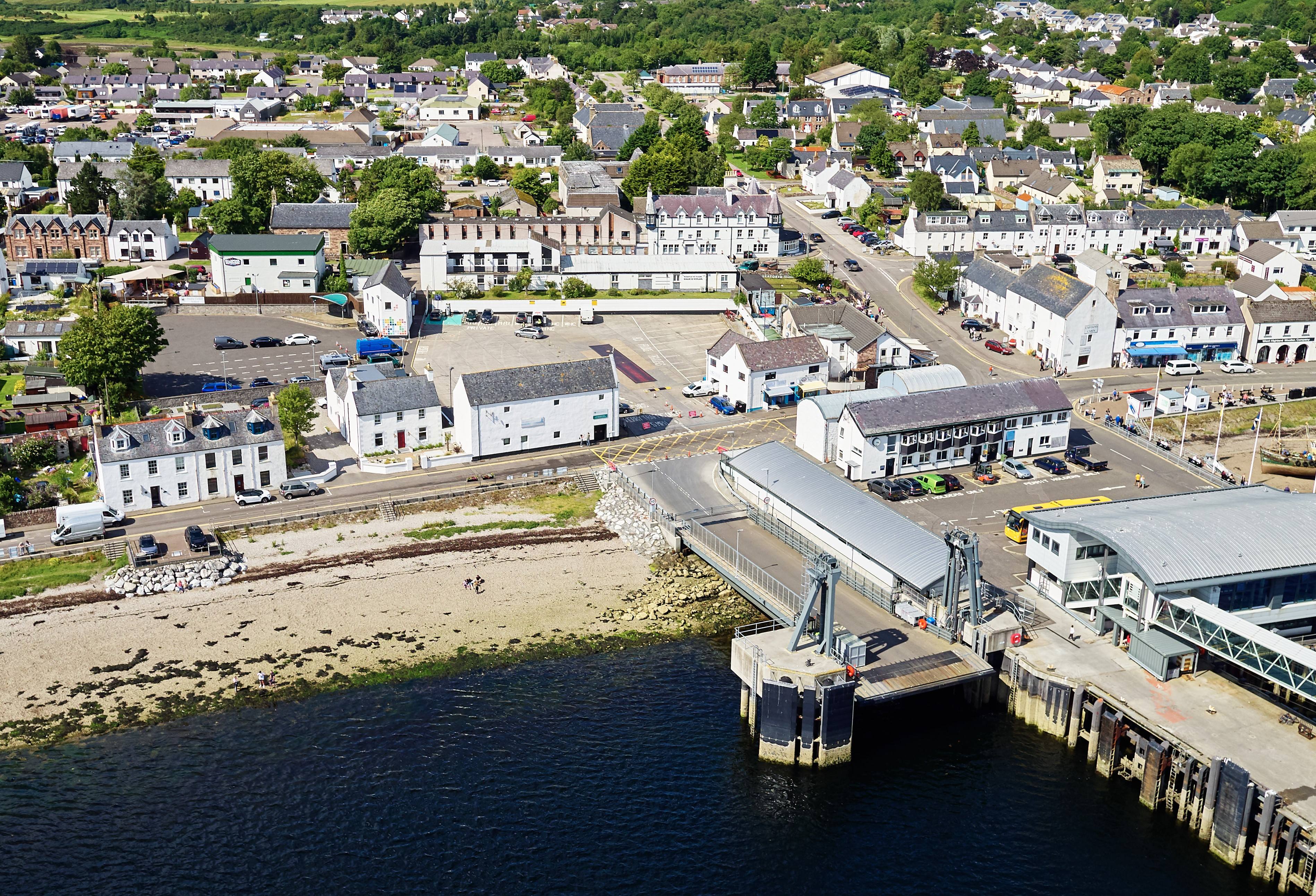 aerial shot of the village of Ullapool including the UHI NWH Ullapool college centre