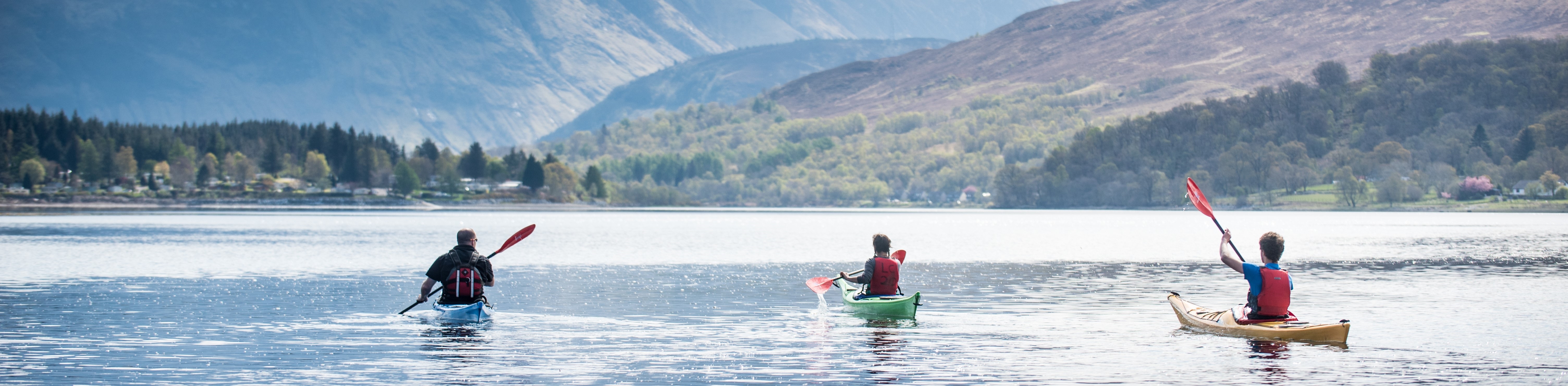 students and lecturer kayaking near Fort William