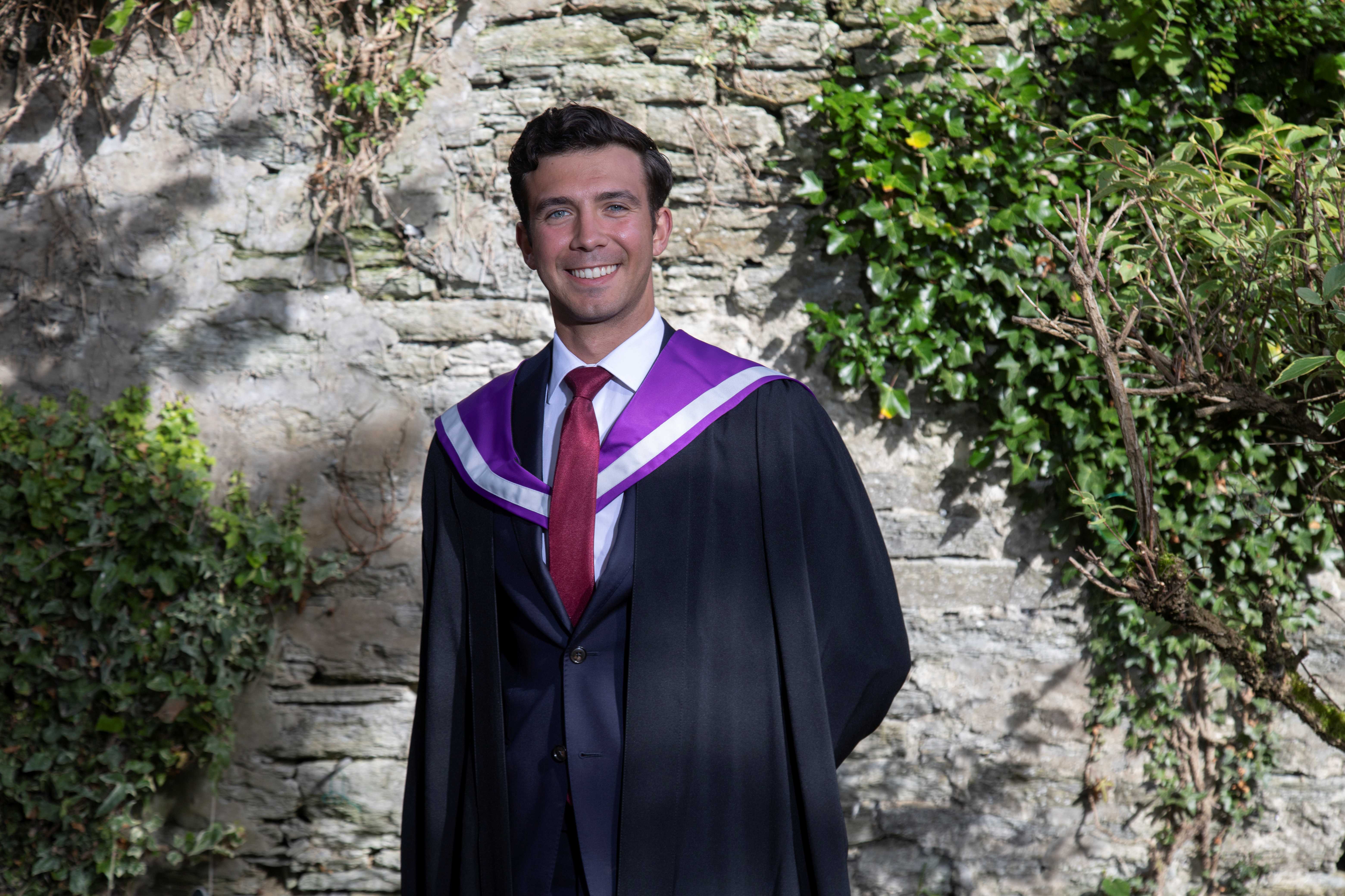 Imagine of equine graduate Julian Agnello at the Thurso graduation ceremony wearing his graduation gown.